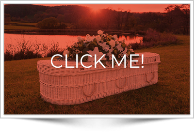 Funeral white woven casket at sunset