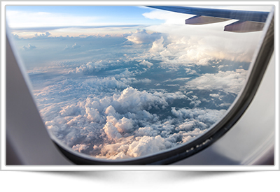 aeroplane window and clouds